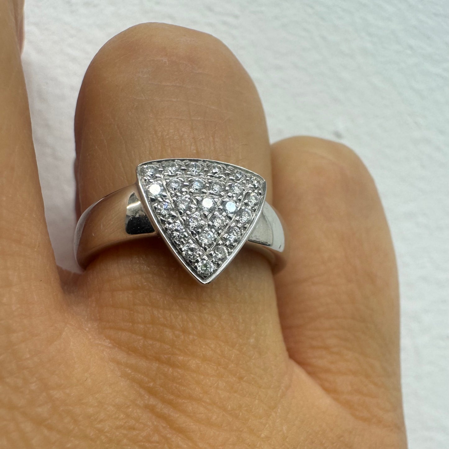 18K gold ring featuring a bold triangular design fully pavé-set with brilliant-cut Diamonds.