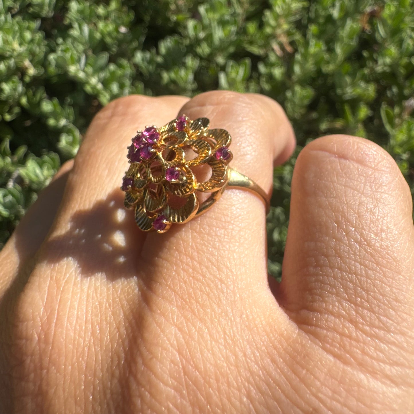18K gold ring crafted in yellow gold, designed in a layered floral motif set with Rubies