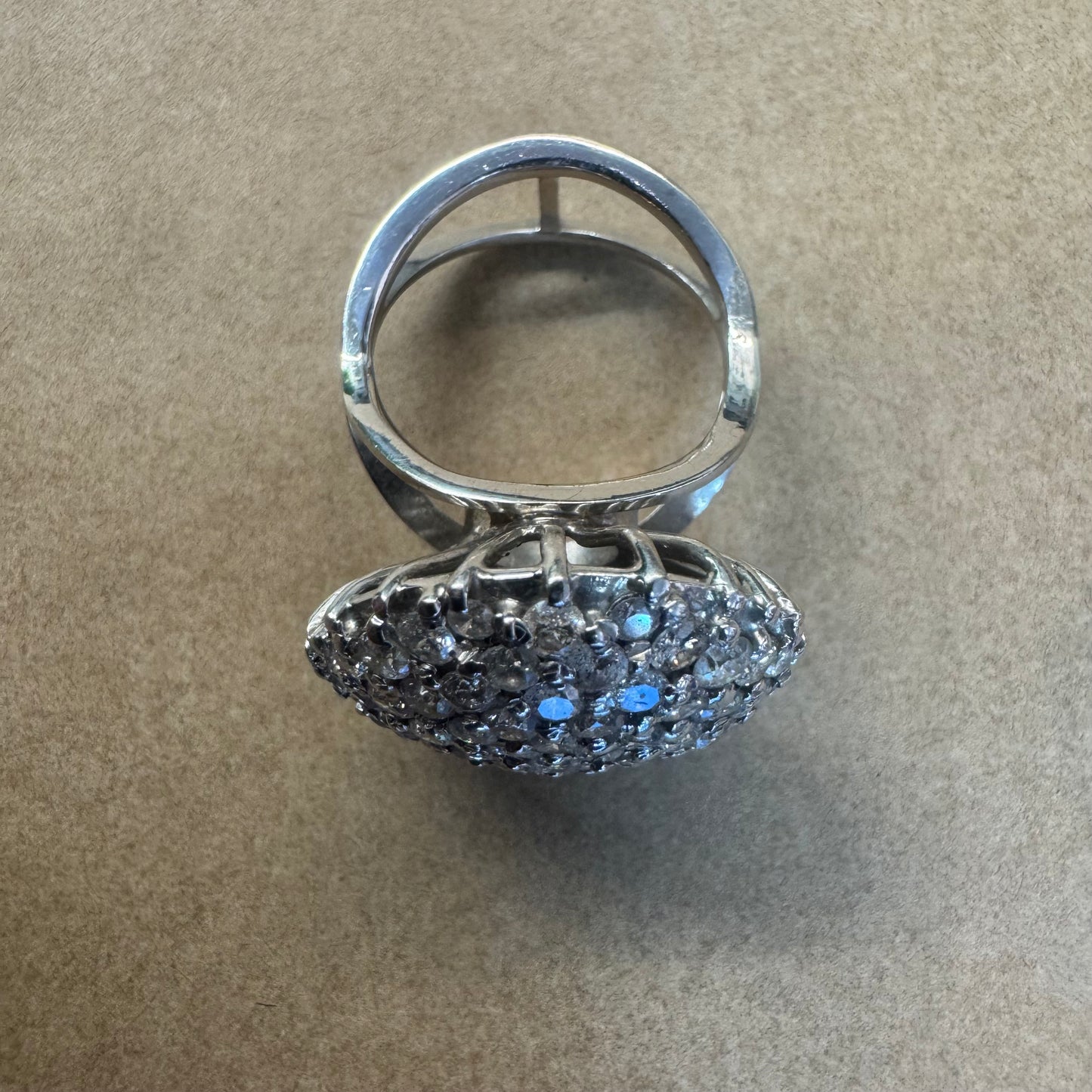 18K gold ring set with Diamonds in a bold pavé setting.