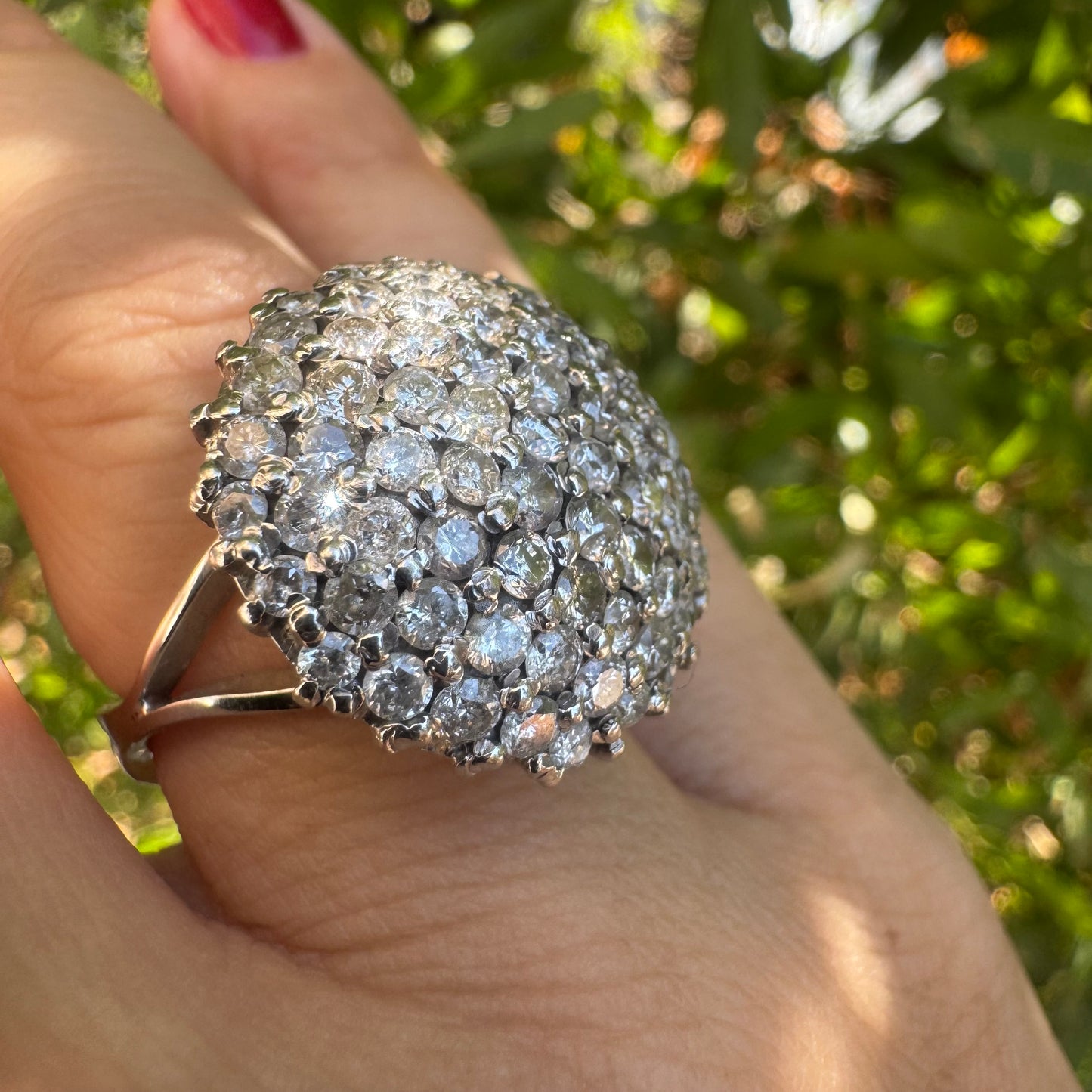 18K gold ring set with Diamonds in a bold pavé setting.