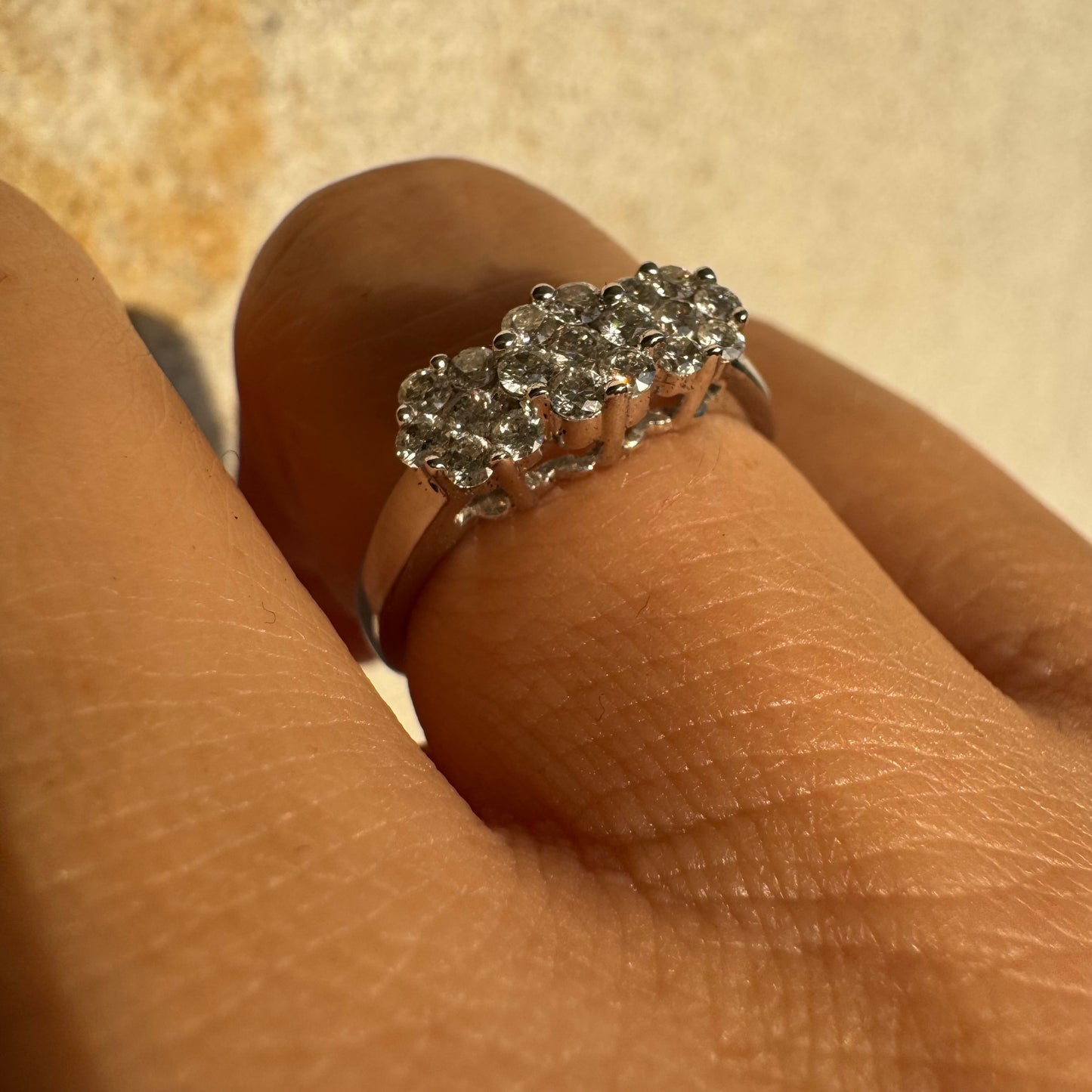 14K white gold ring set with clusters of brilliant white Diamonds