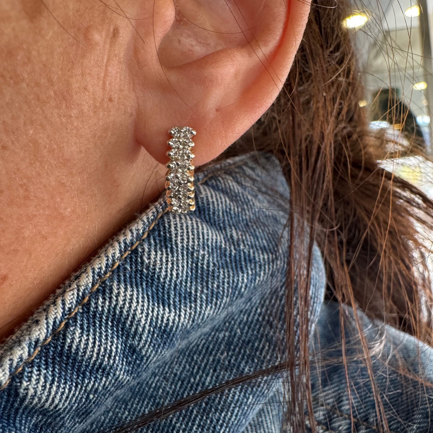 14K gold half-hoop earrings set with sparkling Diamonds in a dense pavé setting