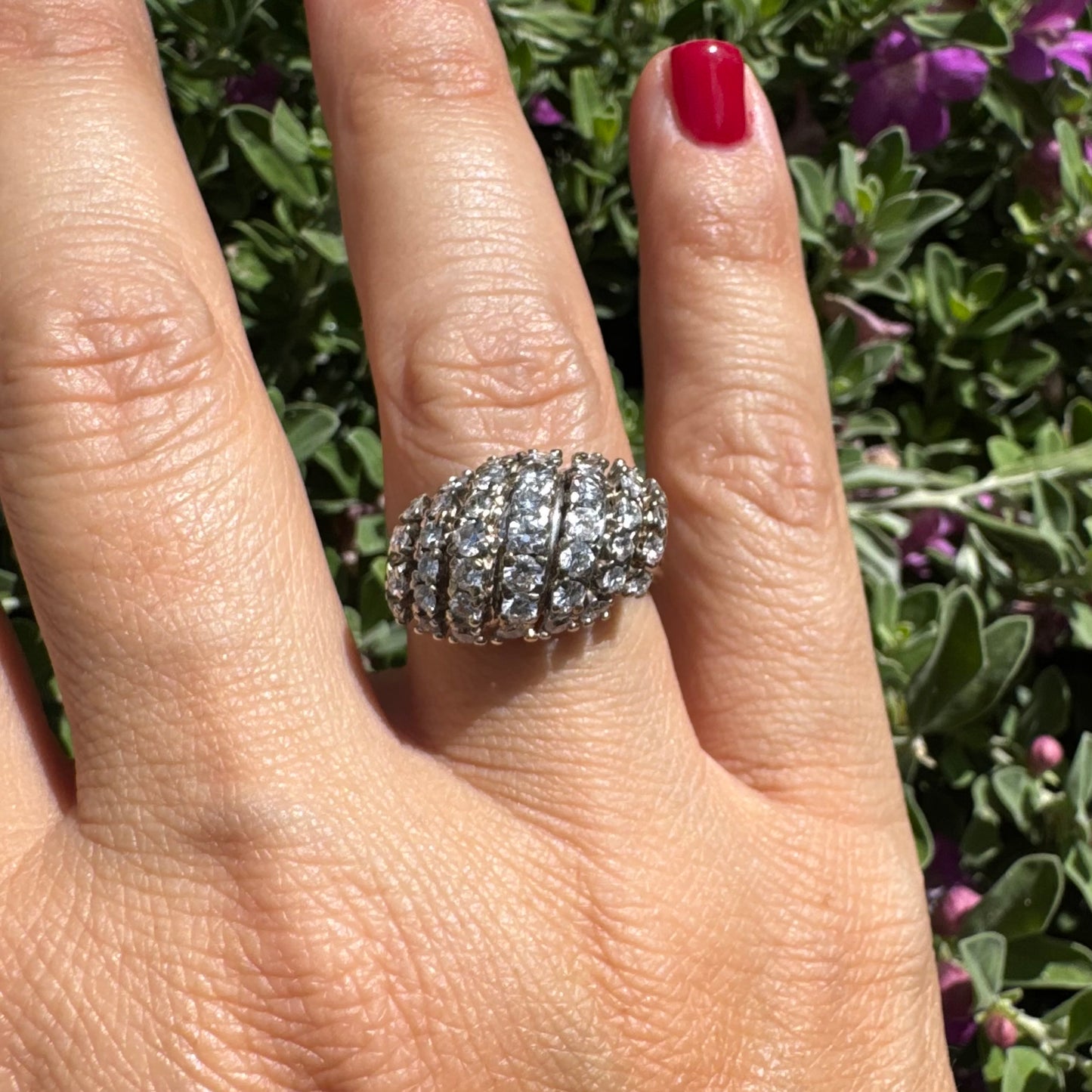 18K gold ring set with rows of sparkling Diamonds in a bold, sculptural design