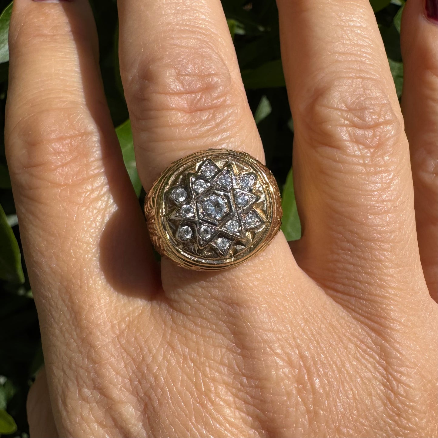 18K gold ring set with a dazzling double Star of David motif, meticulously set with shimmering Diamonds