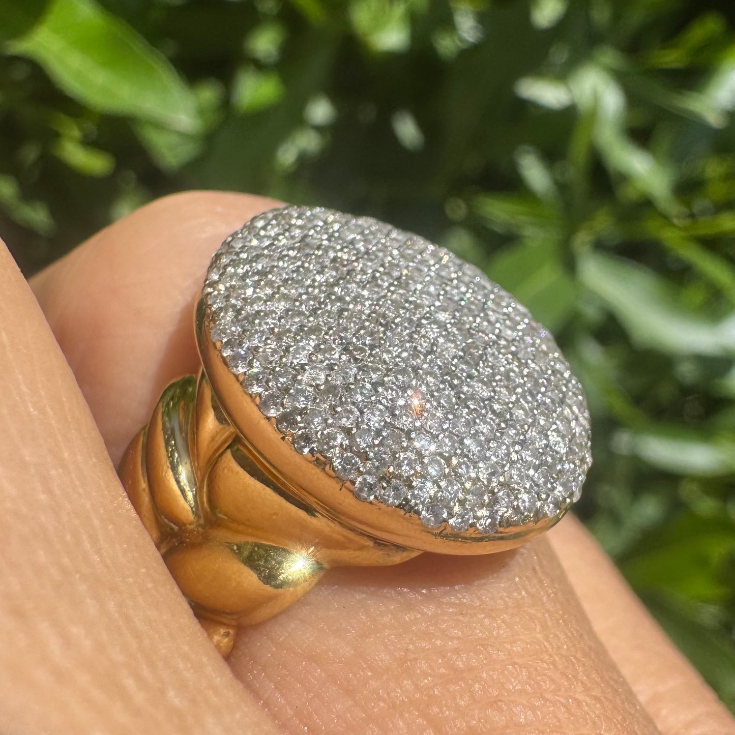 18K gold ring set with a dazzling dome of pavé-set diamonds