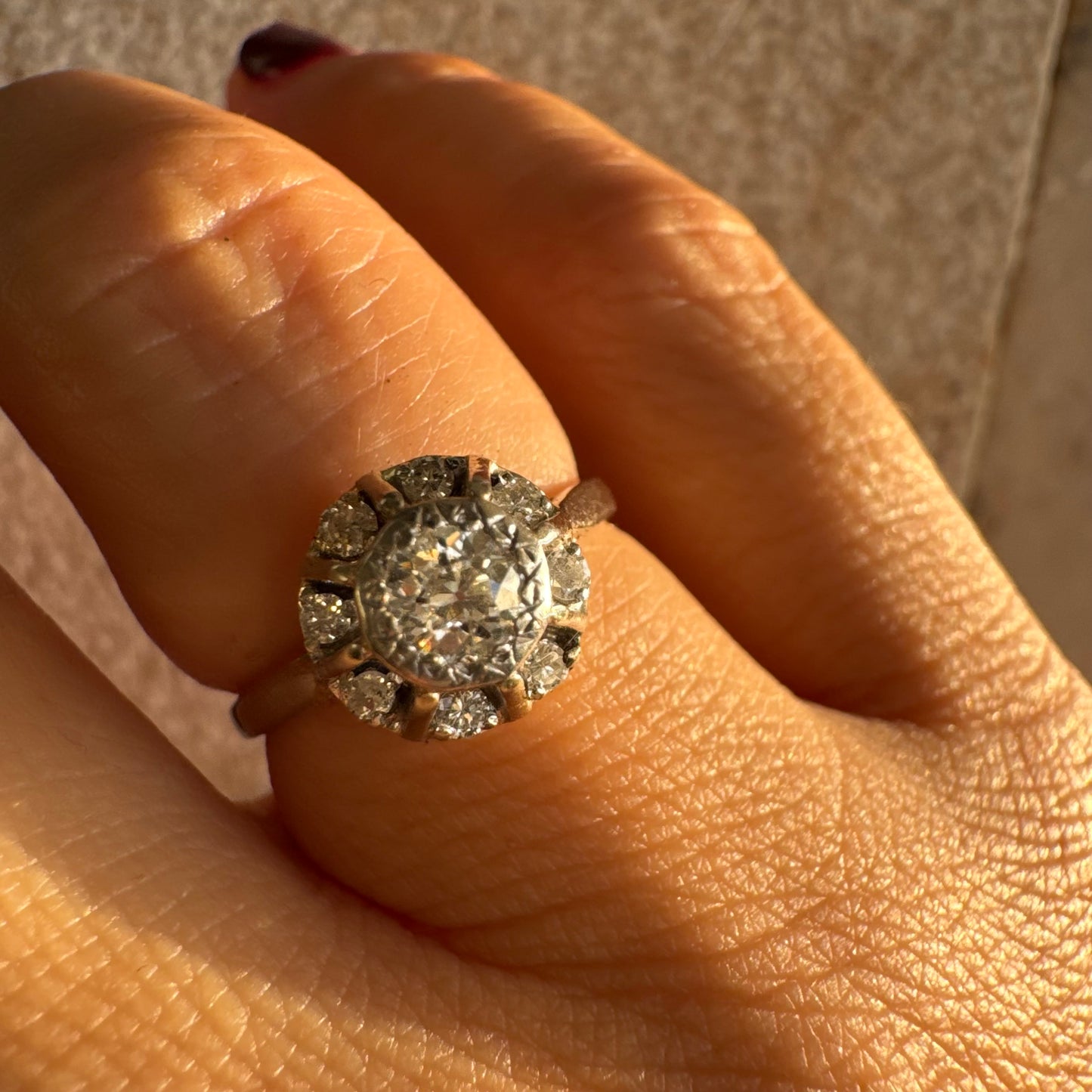 18K gold ring set with Diamonds in     a classic cluster-style