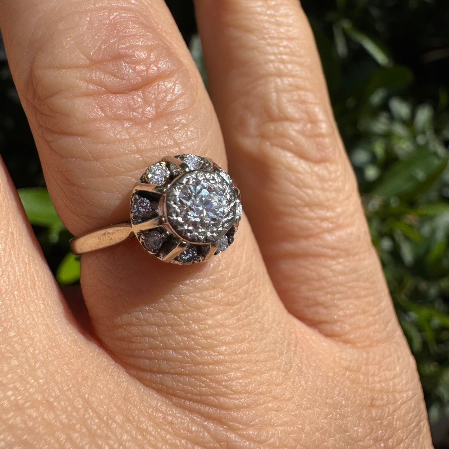 18K gold ring set with Diamonds in     a classic cluster-style