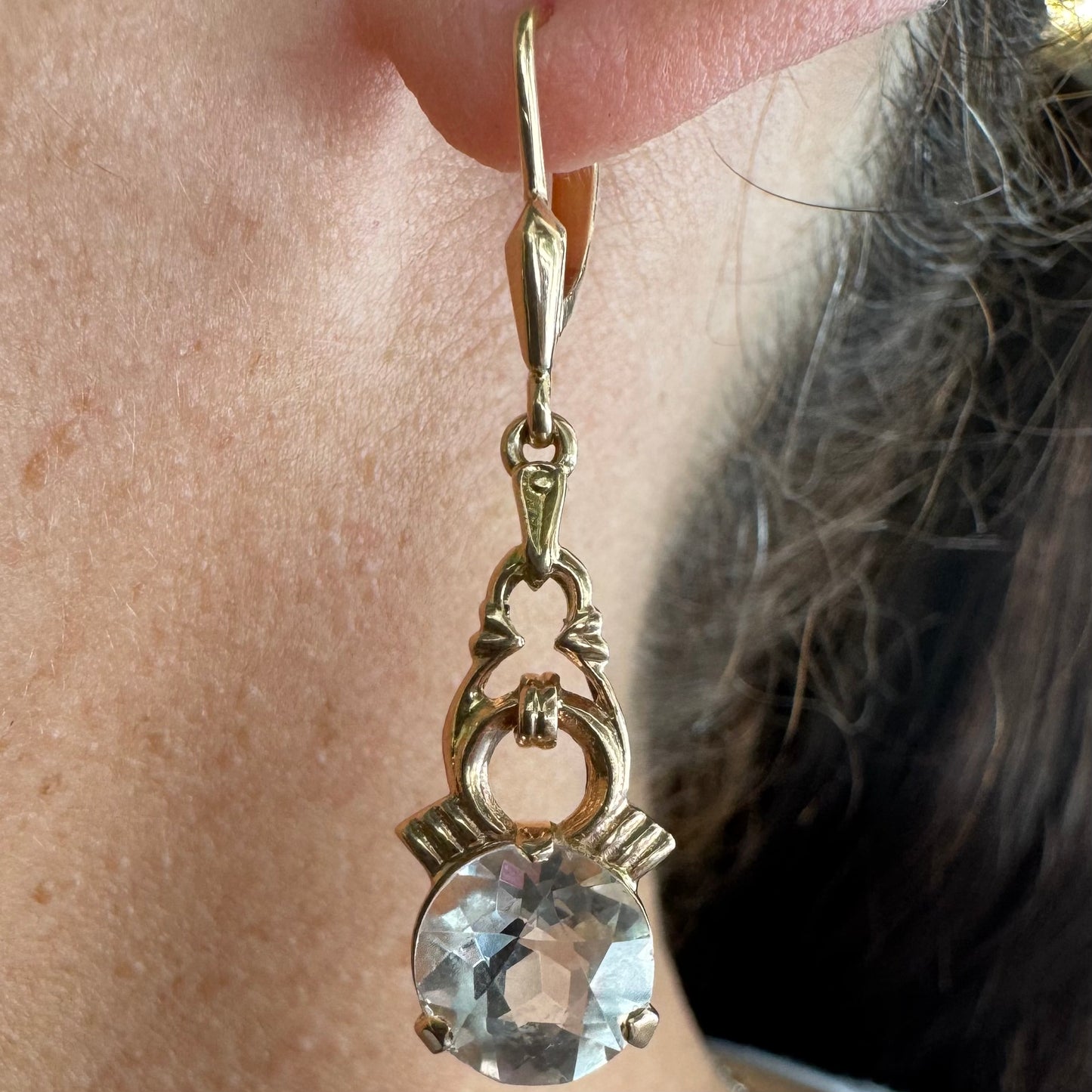 14K gold drop earrings crafted in warm gold, featuring old-cut clear stones