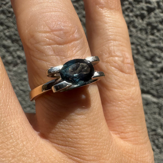 14K gold ring set with an oval-cut Blue Topaz “London”