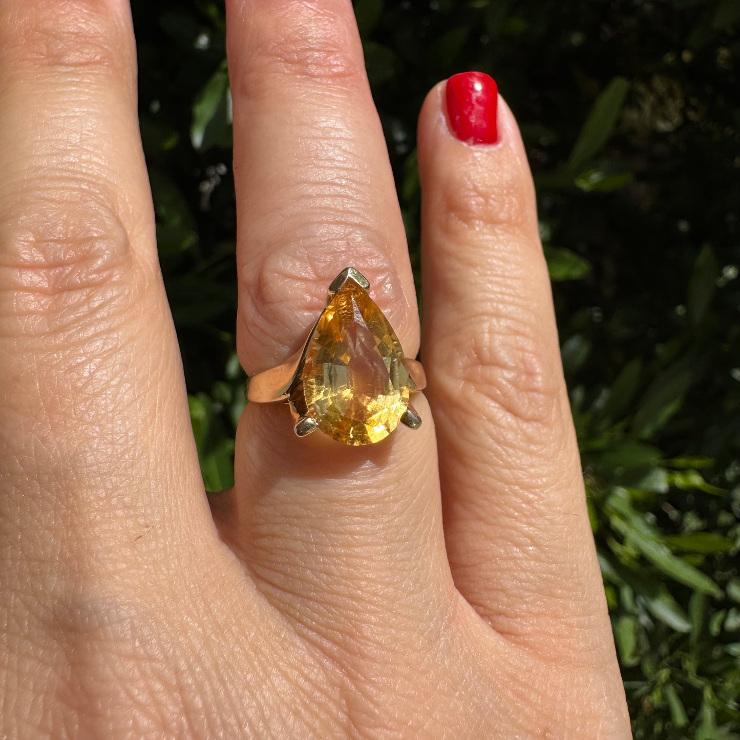 14K gold ring set with a large pear-shaped Citrine