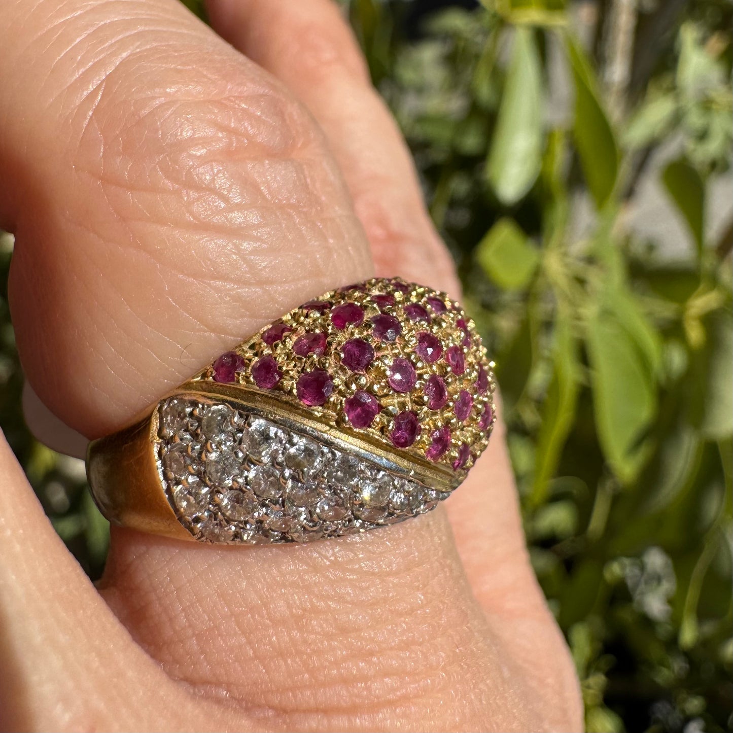 14K gold dome ring pavé-set with Diamonds and vivid Rubies in a striking two-tone design