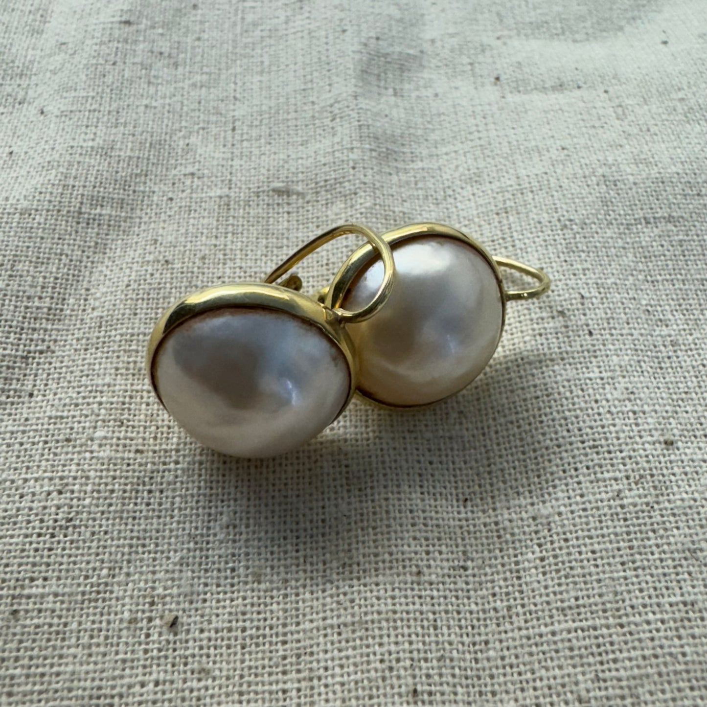 14K gold drop earrings set with flat coin pearls
