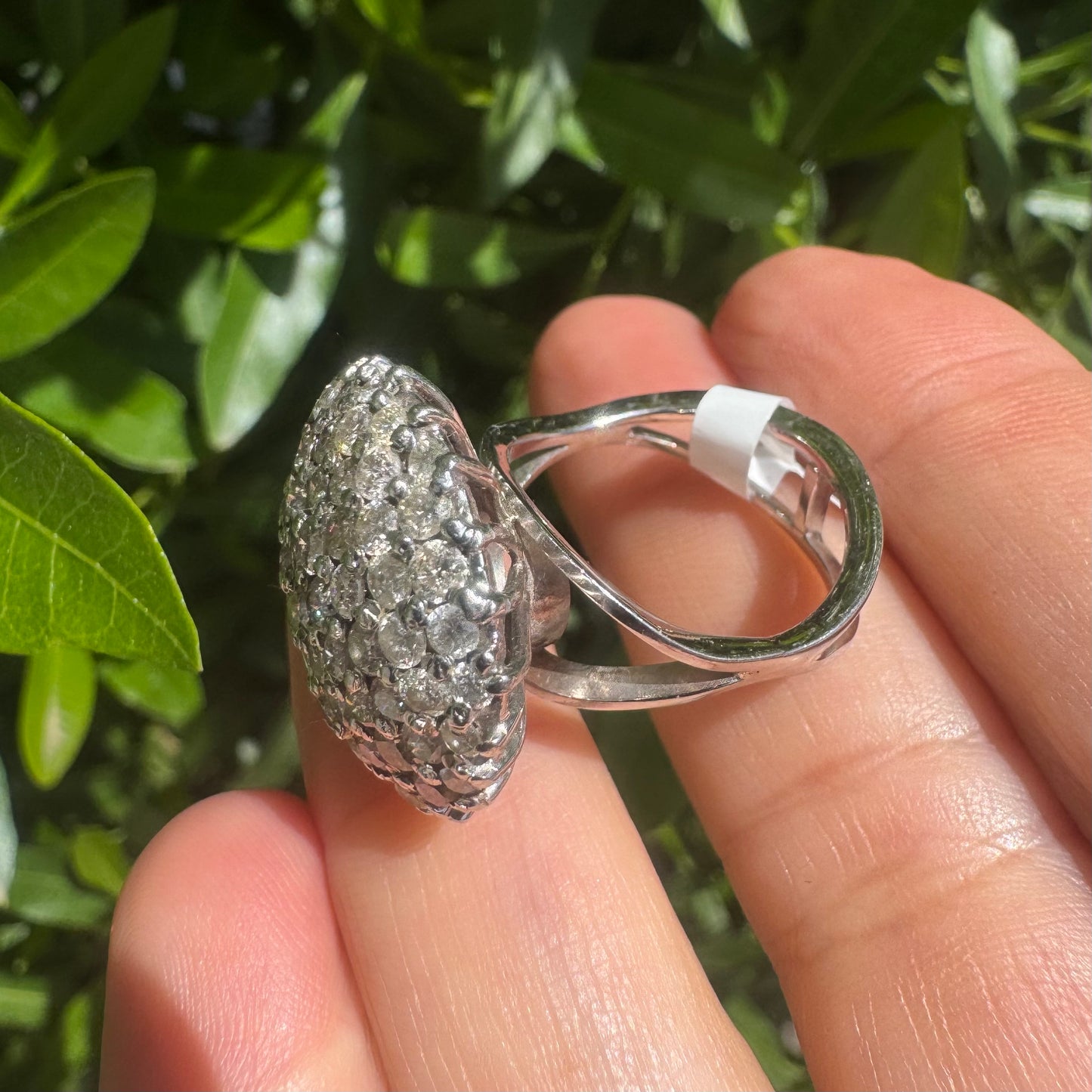 18K gold ring set with Diamonds in a bold pavé setting.