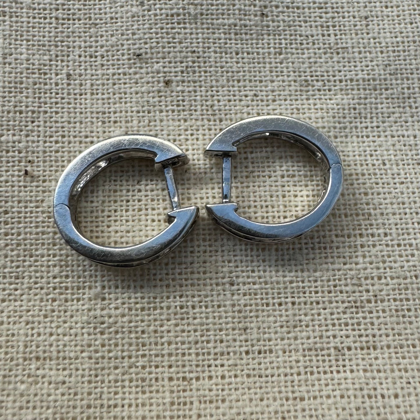 14K gold hoop earring set with a line of baguette-cut Diamonds