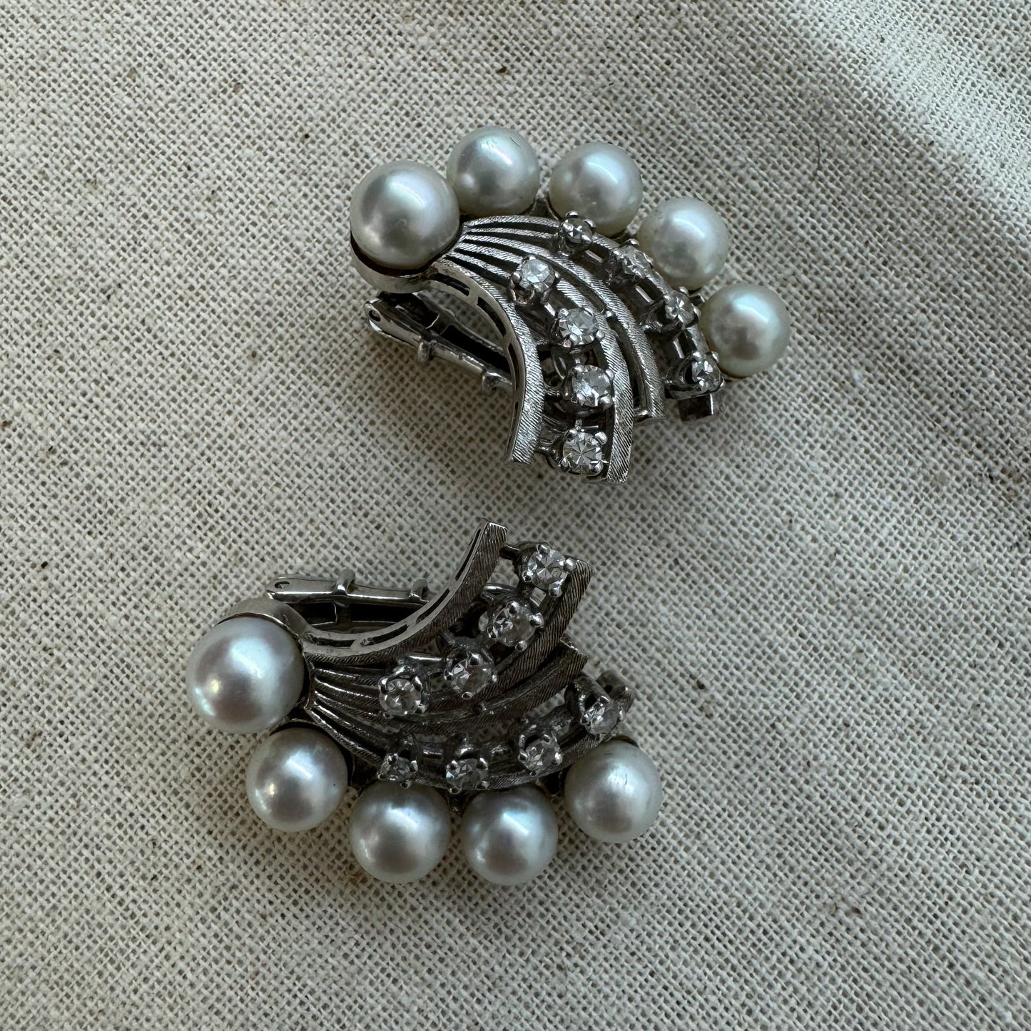 14K gold clip-on earrings set with lustrous pearls & sparkling Diamonds