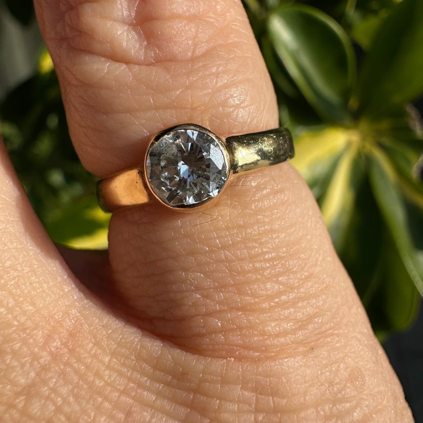 14K gold ring set with one center Diamond