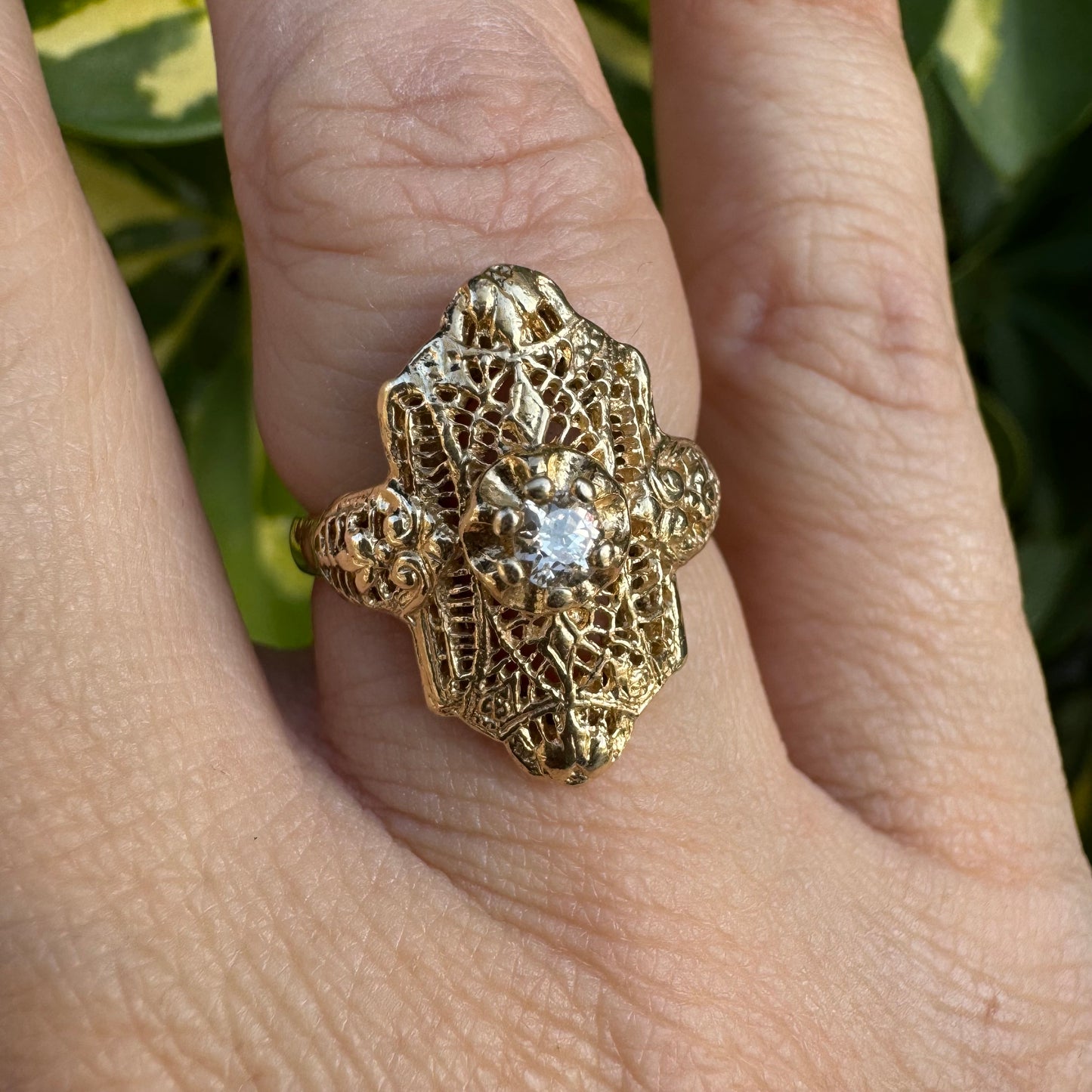14K gold filigree ring set with an old-cut Diamond