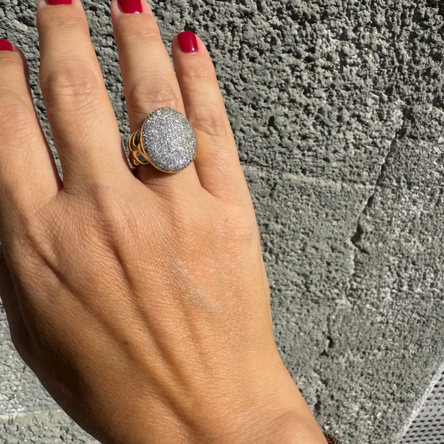 18K gold ring set with a dazzling dome of pavé-set diamonds