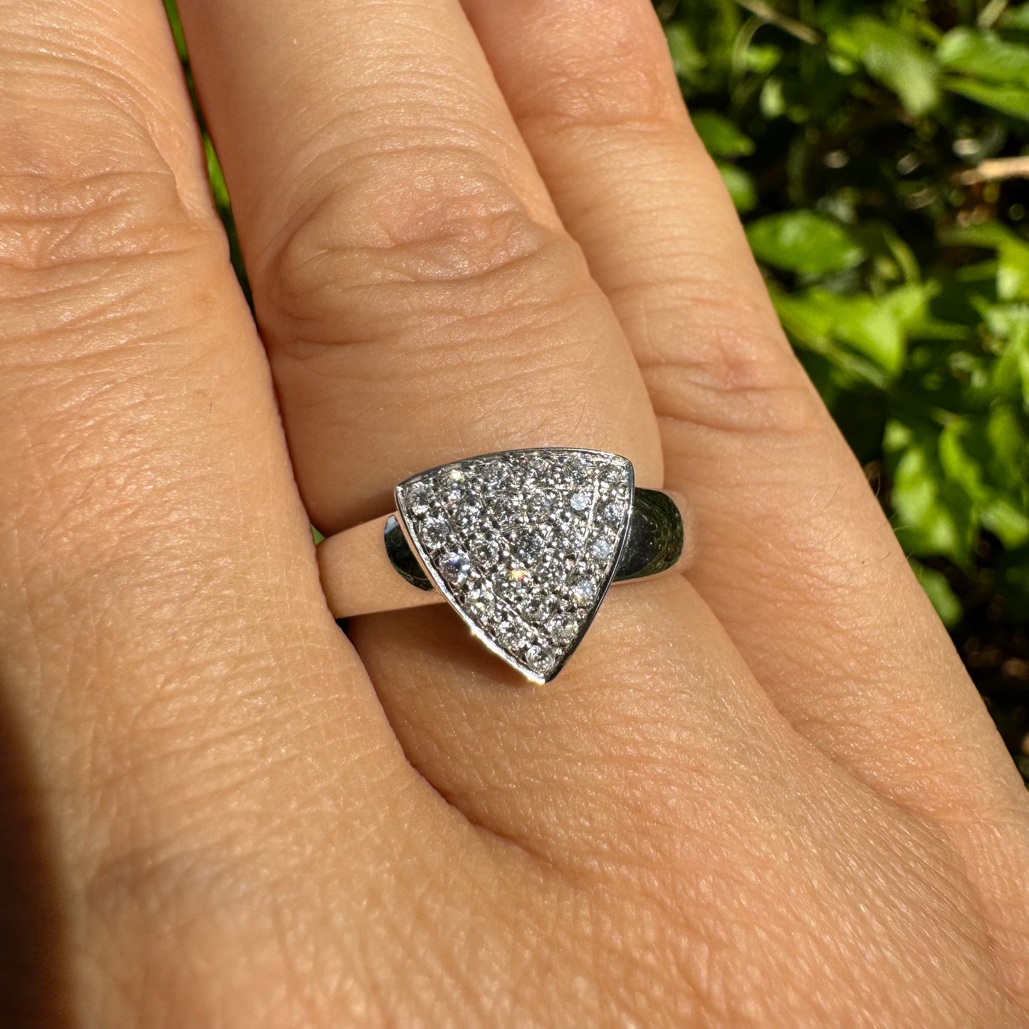 18K gold ring featuring a bold triangular design fully pavé-set with brilliant-cut Diamonds.