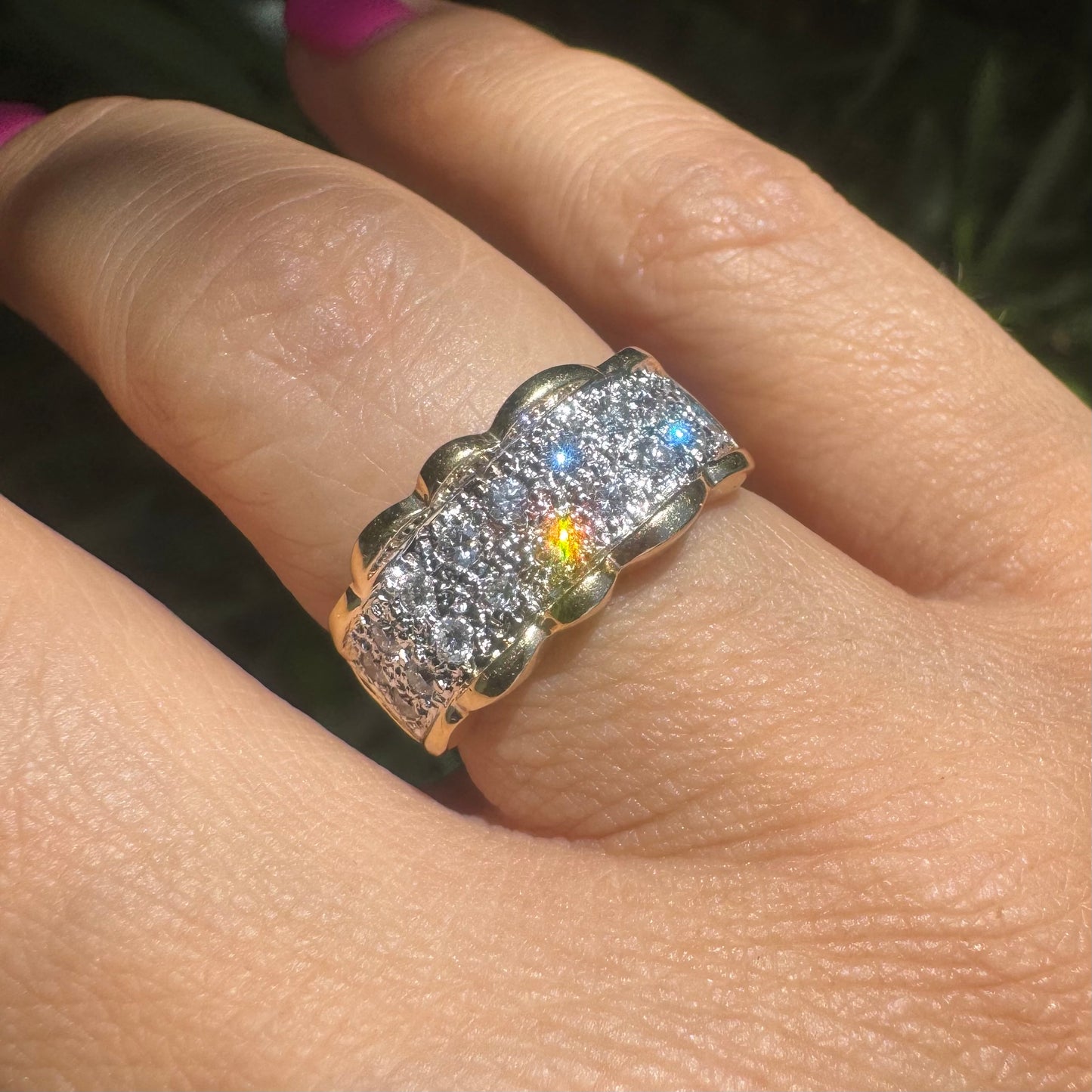 14K gold ring set with center pavé of sparkling Diamonds framed with softly waved gold edges