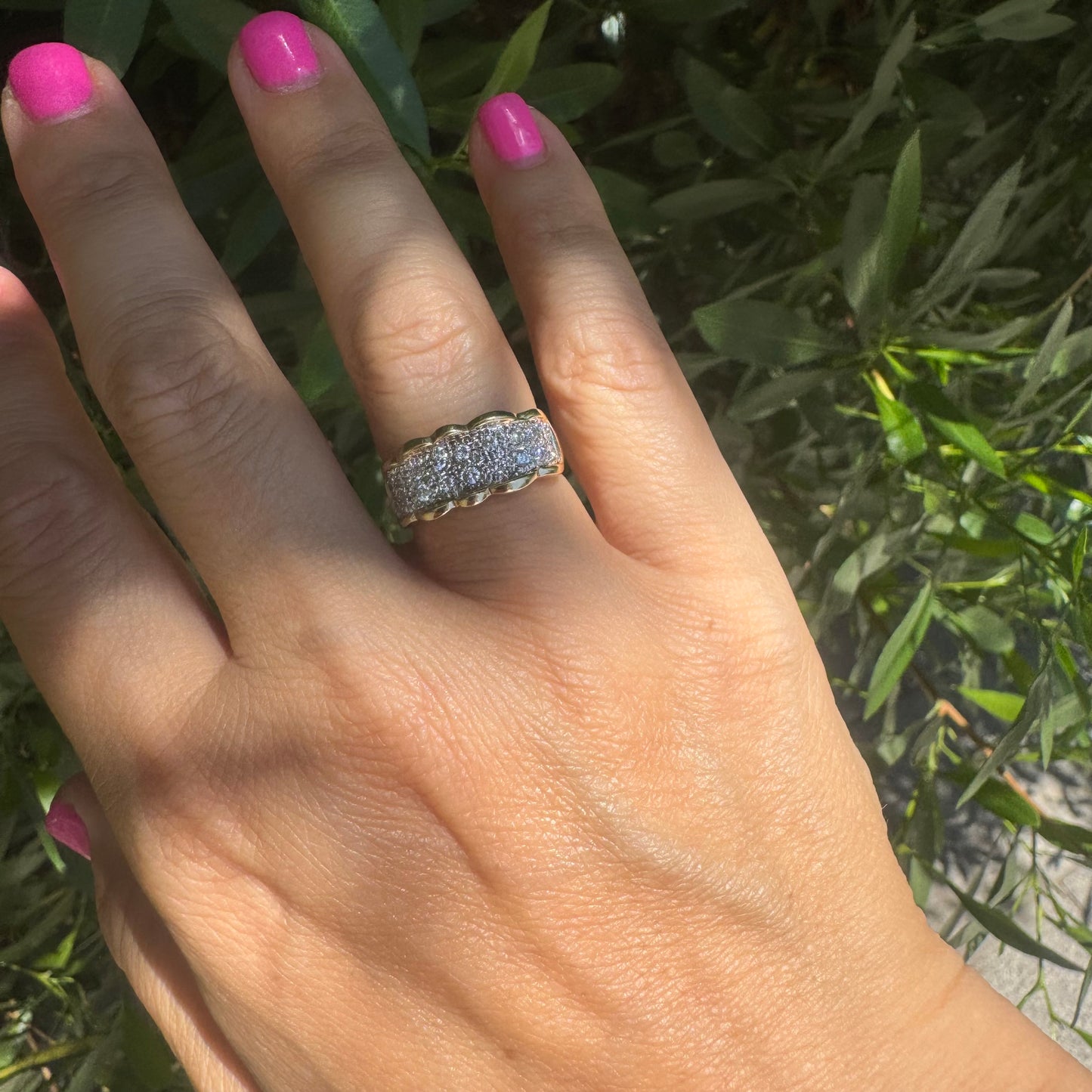 14K gold ring set with center pavé of sparkling Diamonds framed with softly waved gold edges