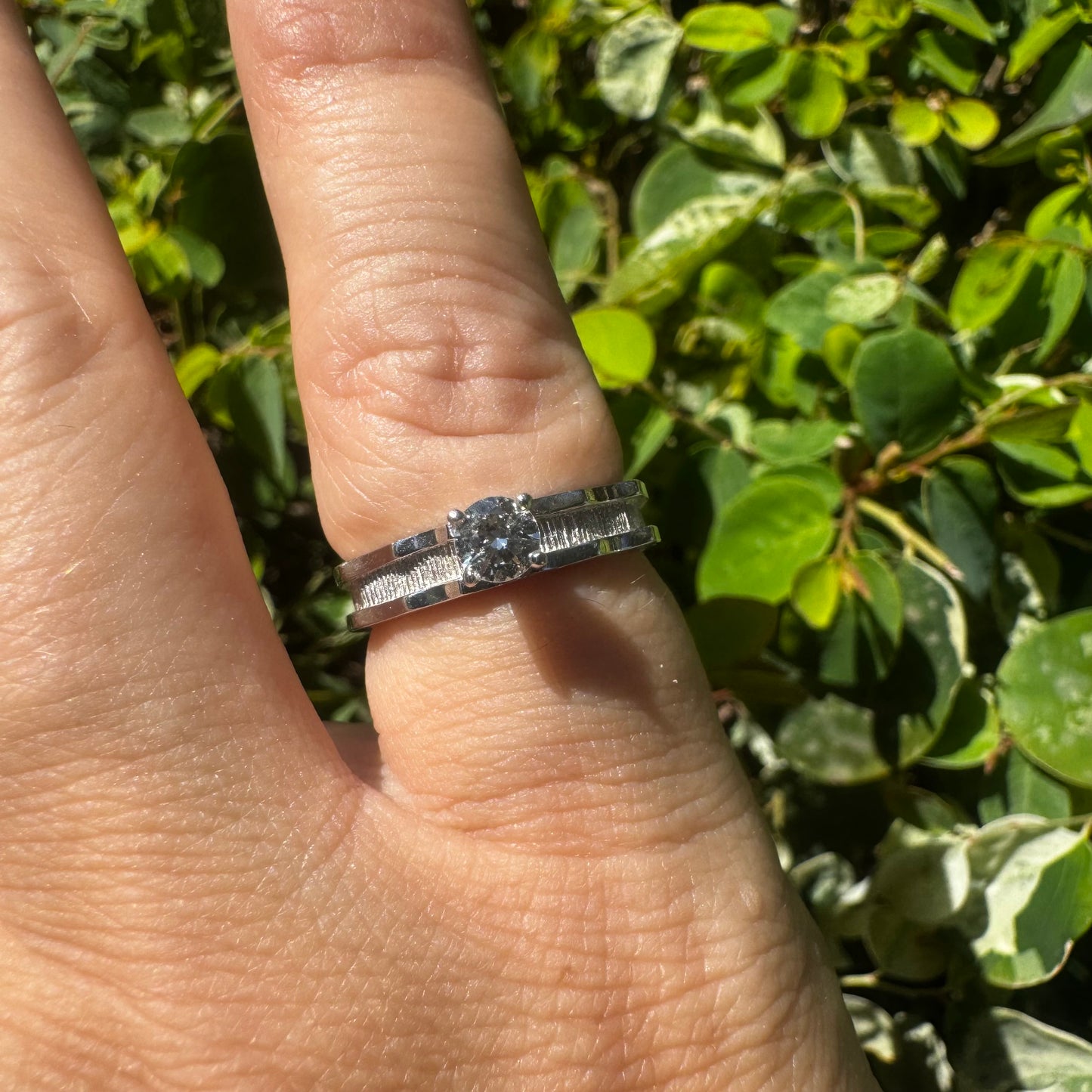 14K gold ring set with one center Diamond