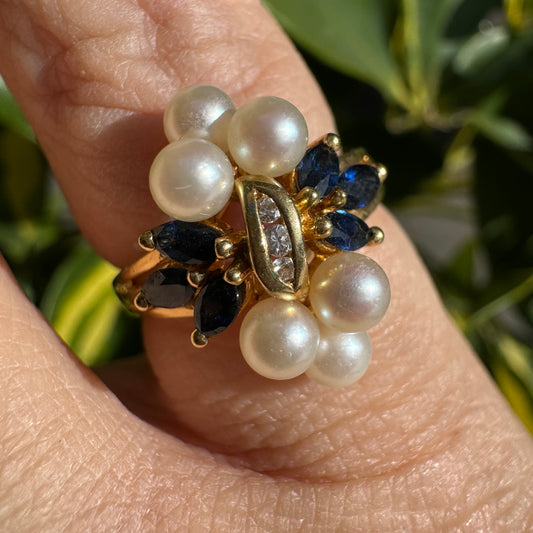 18K gold floral-inspired ring set with Diamonds, Sapphire & Pearls