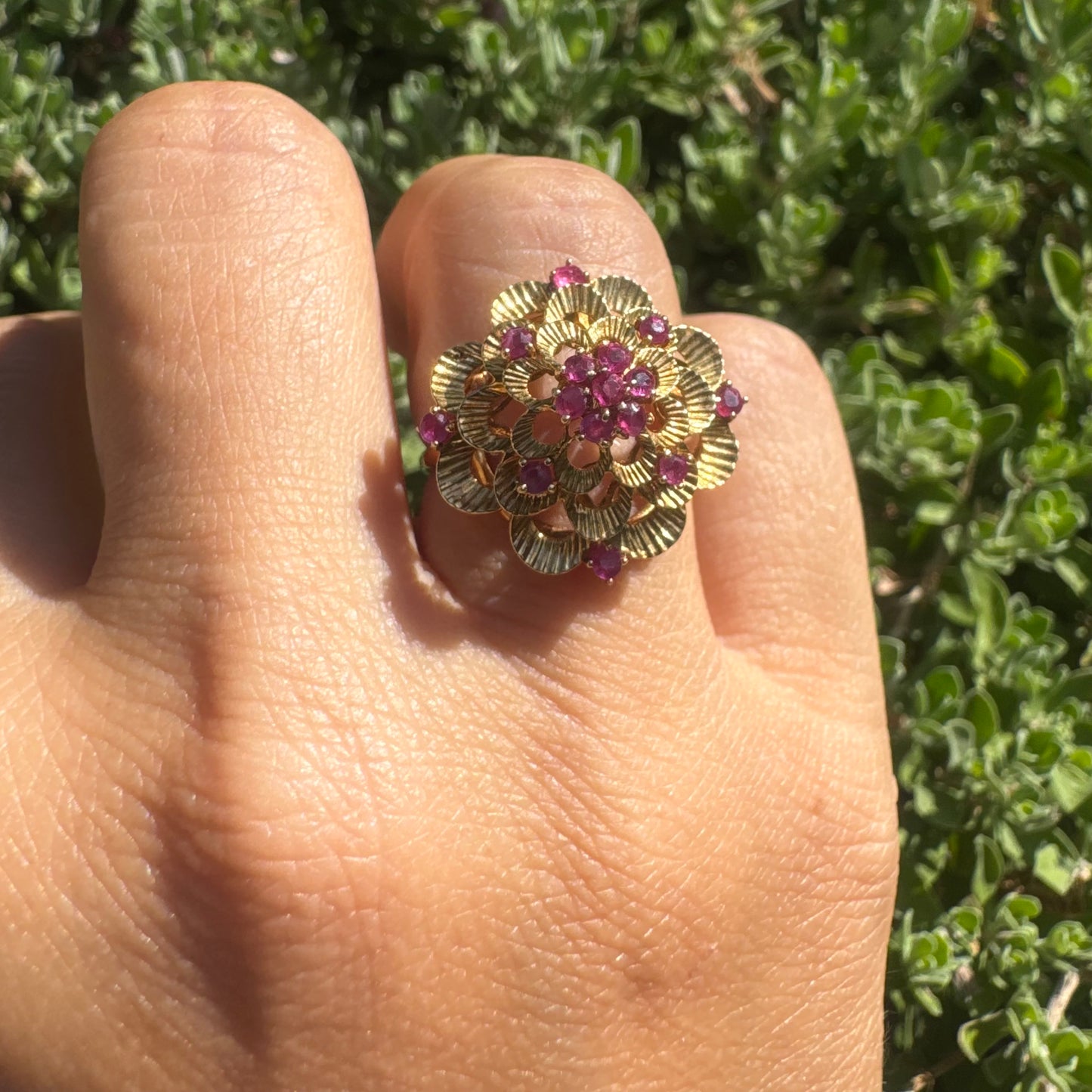 18K gold ring crafted in yellow gold, designed in a layered floral motif set with Rubies