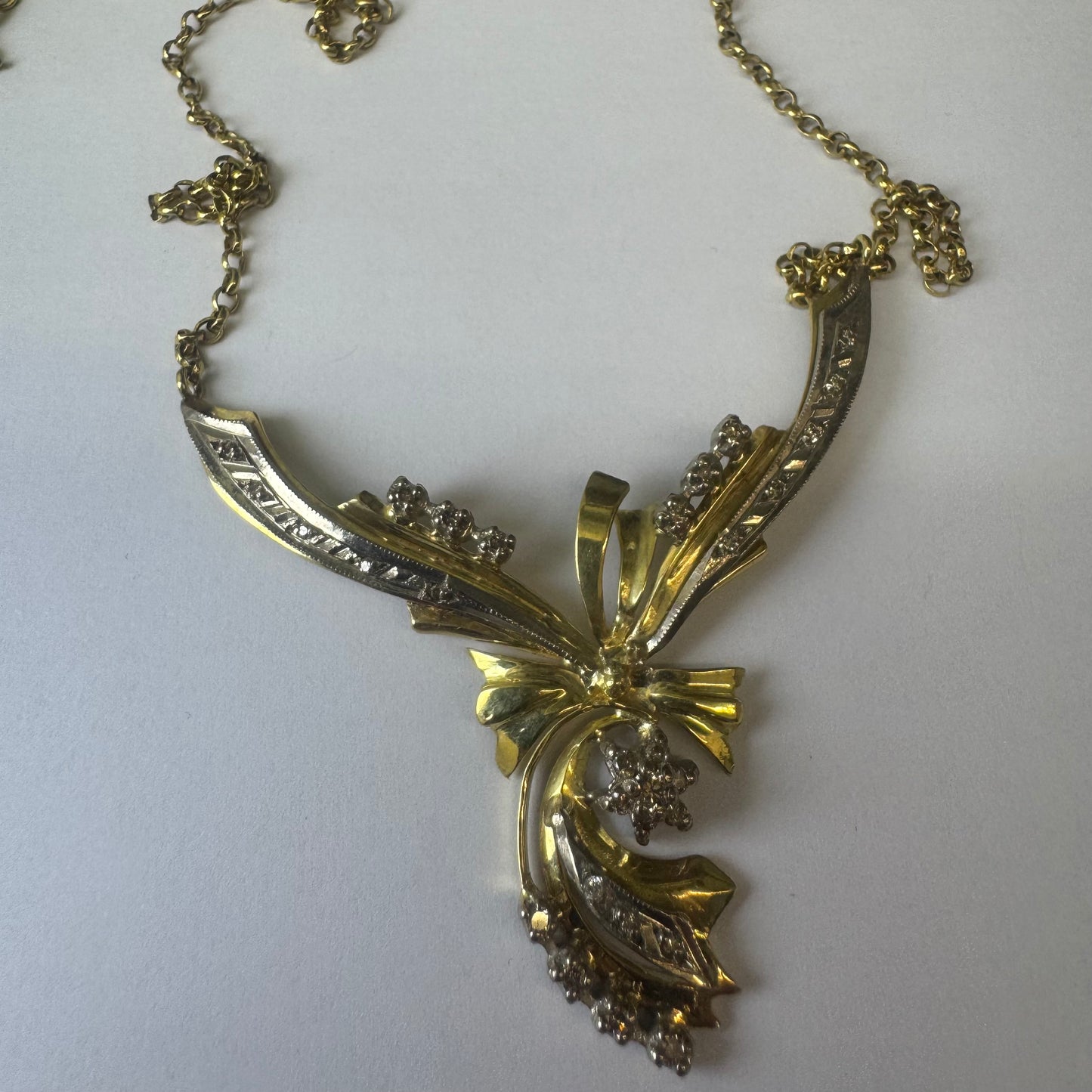 18K two-tone vintage necklace with a unique and elegant design set with Diamonds