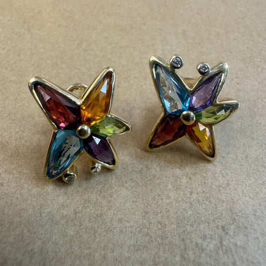 עגילי זהב צהוב 14 קראט צמודים לאוזן משובצים מבחר אבני חן ויהלומים.