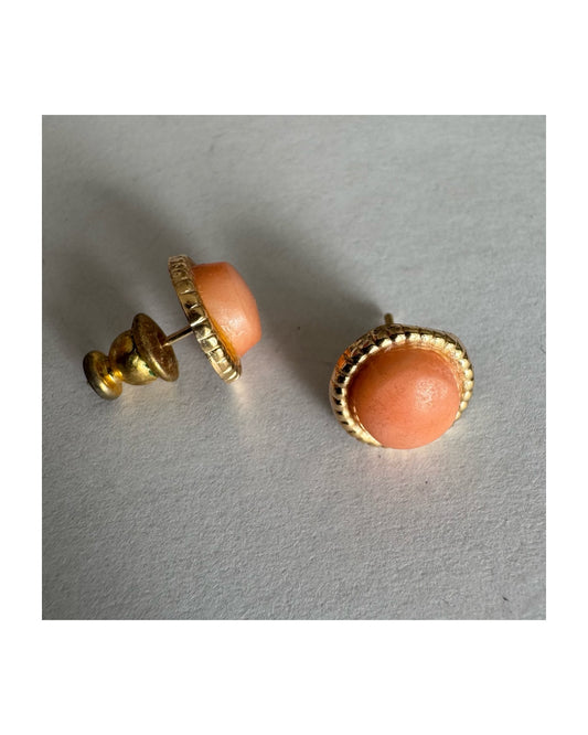 14K gold stud earrings set with natural Coral stones in a soft peach-pink tone.