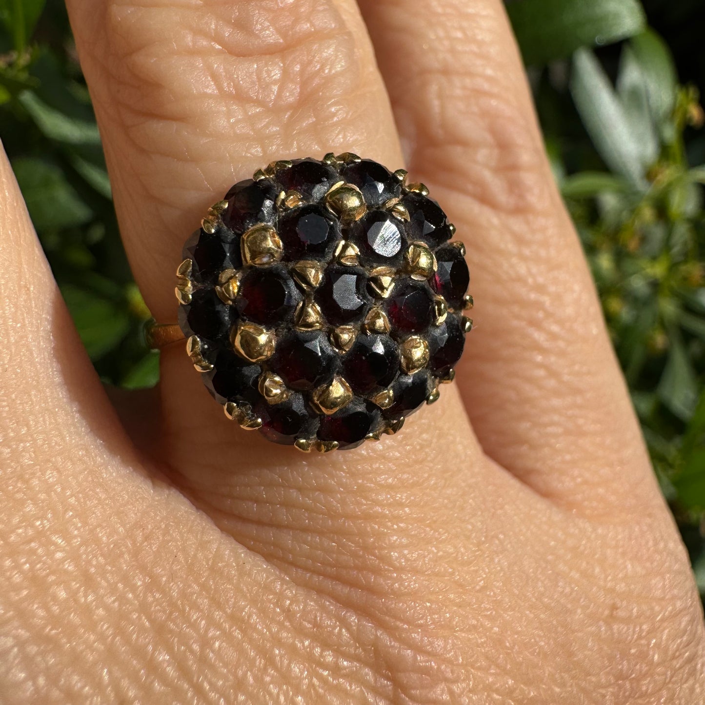 18K gold ring set with Garnets in rich gold prong settings