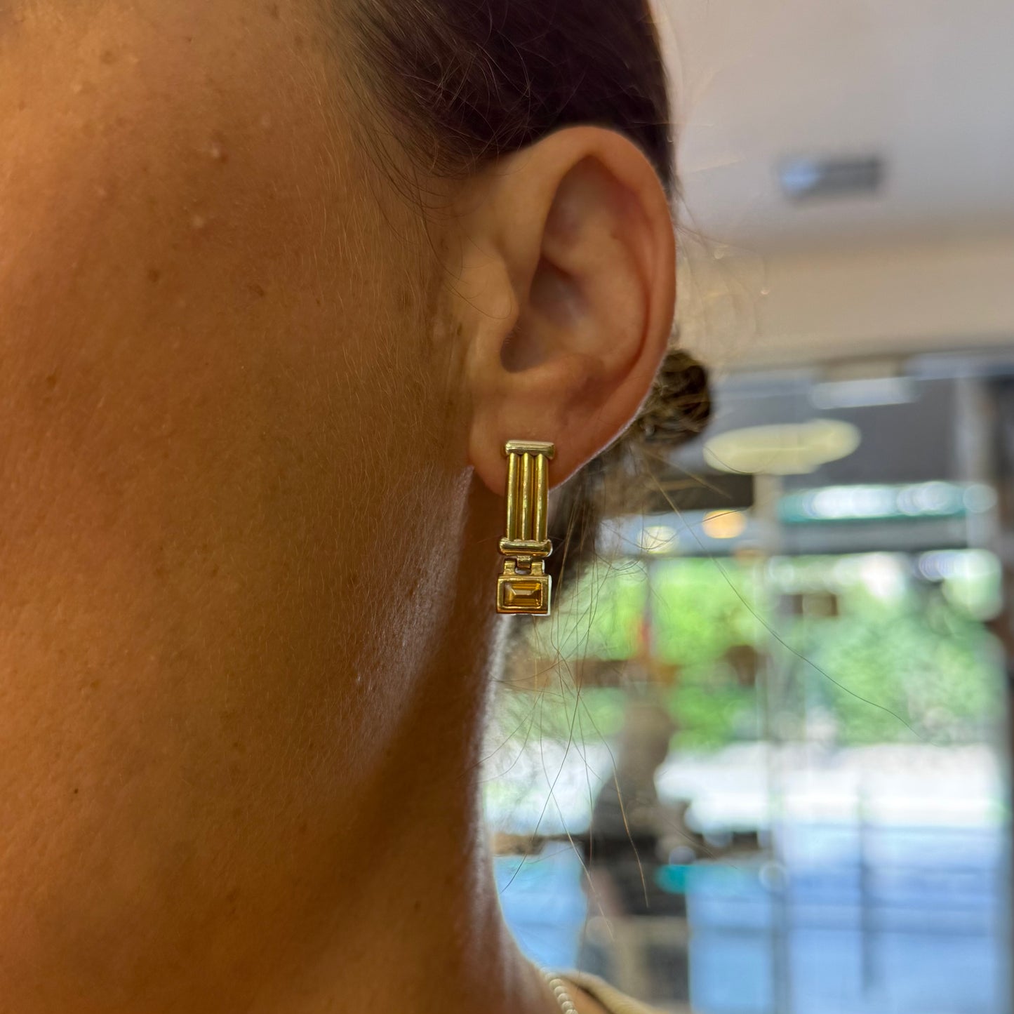 14K gold stud earrings set with a warm honey-colored Citrine