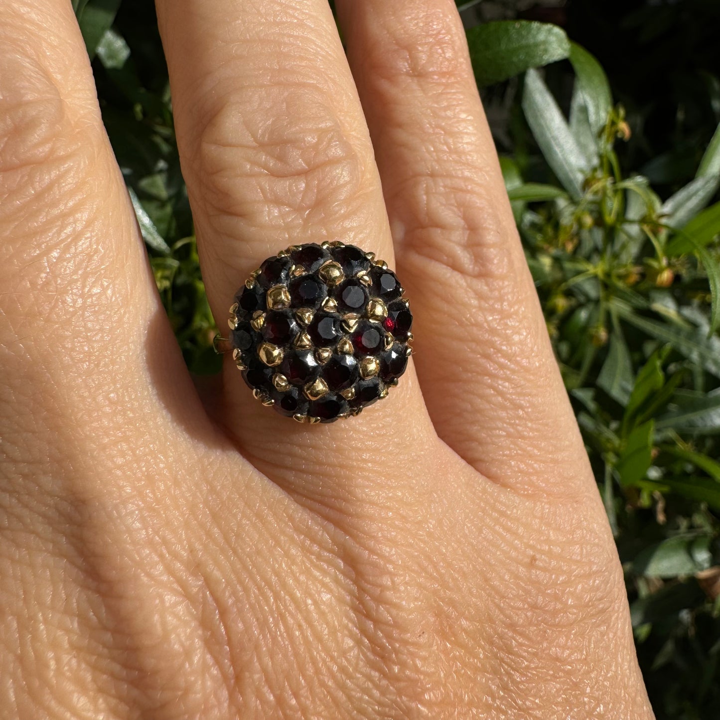 18K gold ring set with Garnets in rich gold prong settings
