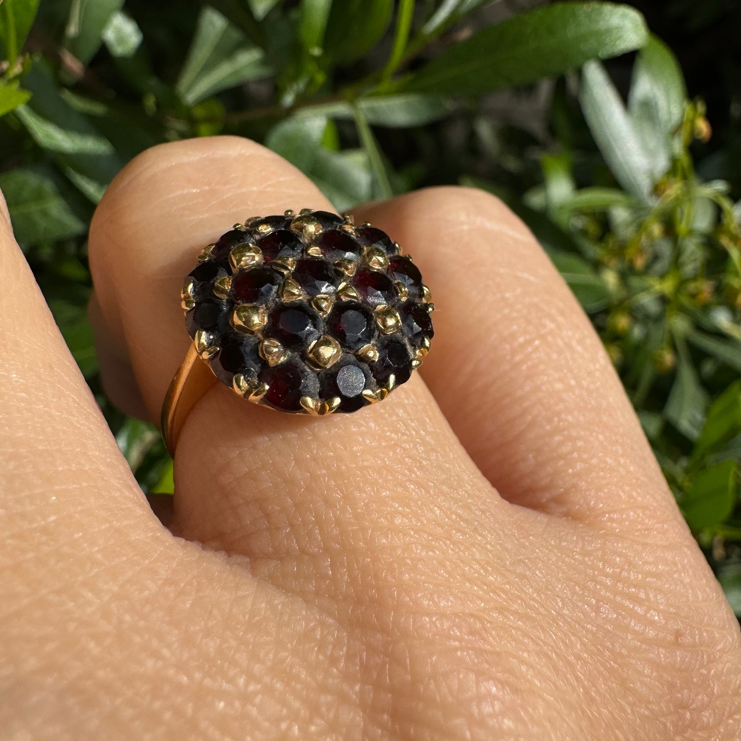 18K gold ring set with Garnets in rich gold prong settings