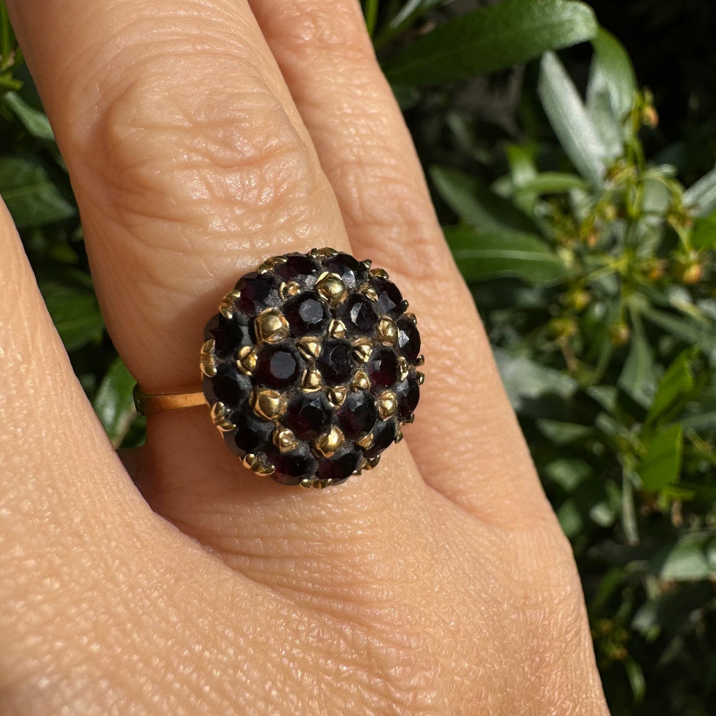 18K gold ring set with Garnets in rich gold prong settings