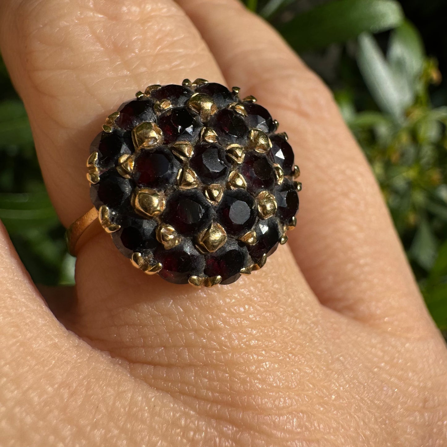18K gold ring set with Garnets in rich gold prong settings