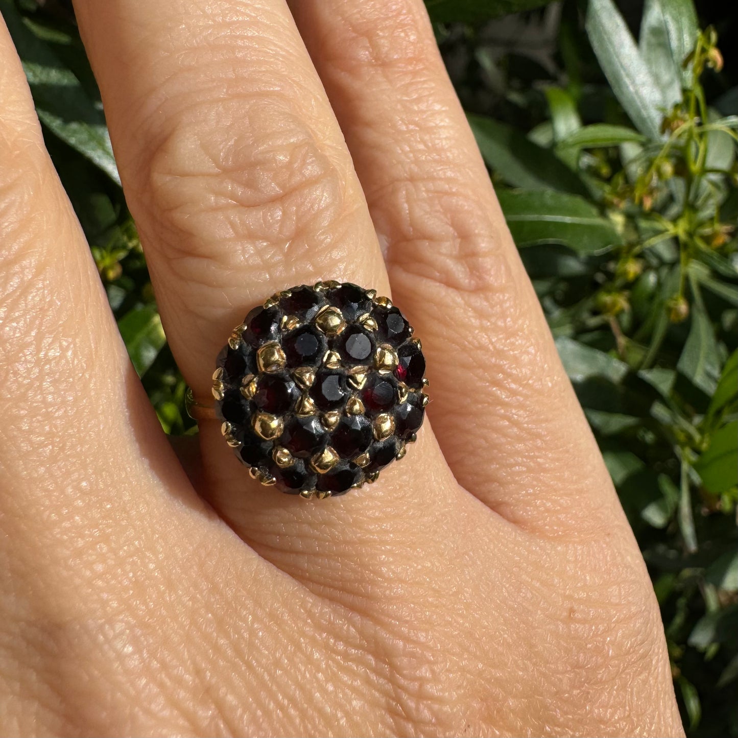 18K gold ring set with Garnets in rich gold prong settings