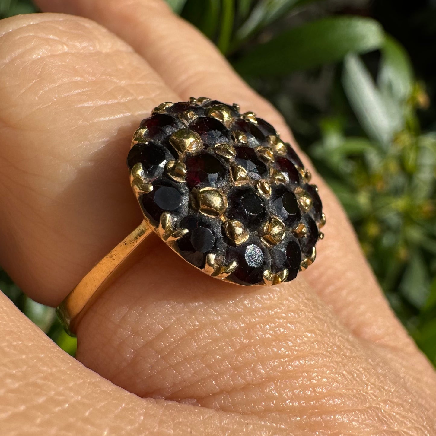 18K gold ring set with Garnets in rich gold prong settings